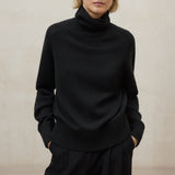 블랙 카퀴 스웨터